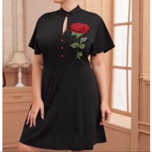 Black dress with red rose detail and keyhole front